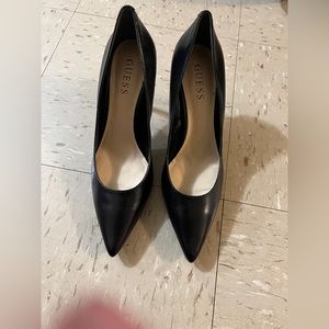 Black Guess heels, size 7 1/2 never worn. Leopard print on heel.